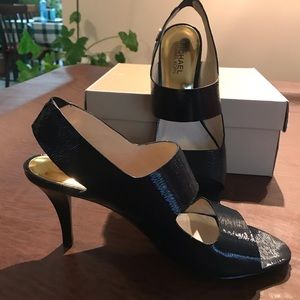 Michael Kors Rochelle open toe Sandals.